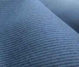 metre karesi 400 gram ağırlığında olan %100 pamuktan üretilmiş, armürlü dokunmuş corduroy kumaş